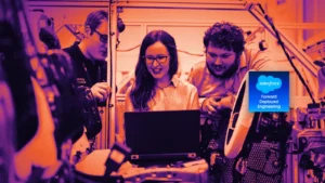 Arcsen engineers at work, with the Salesforce Forward Deployed Engineering badge
