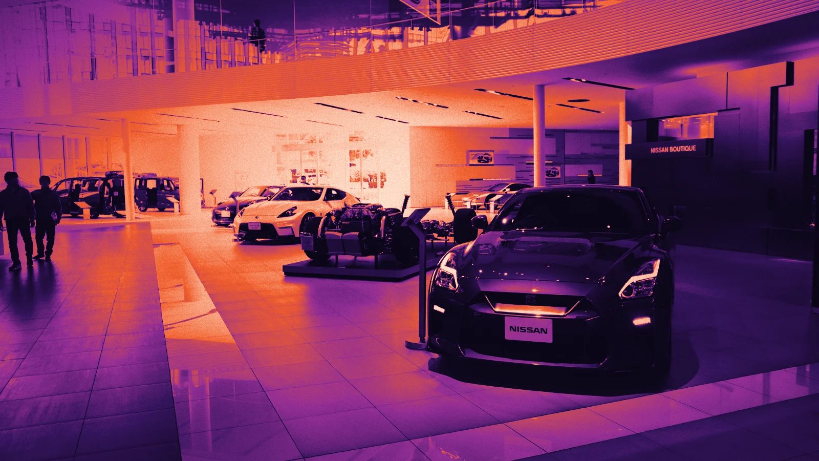 A car showroom with a sports car on display, in Arcsen colours