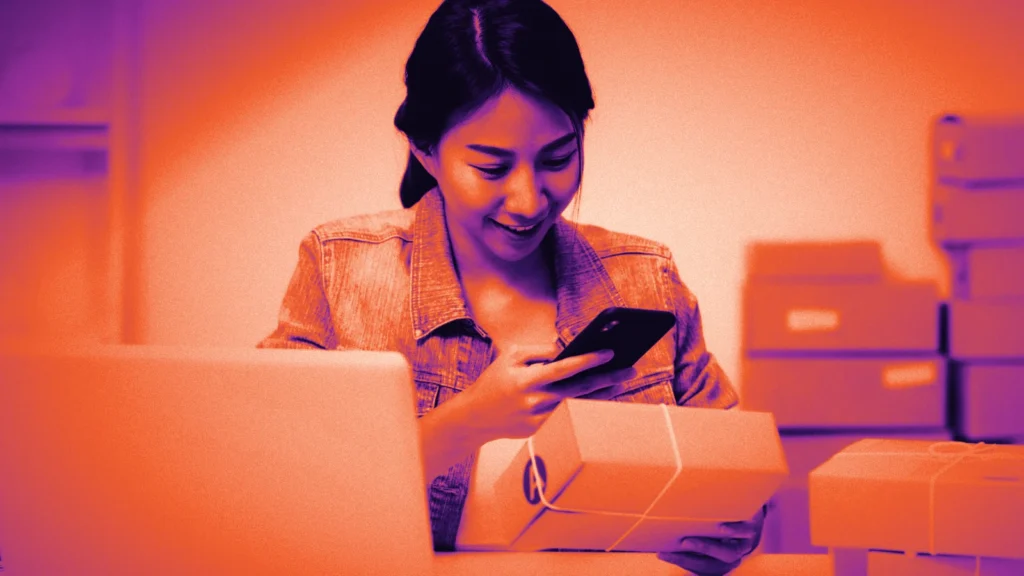 A woman checking a parcel delivery on her phone, in Arcsen colours