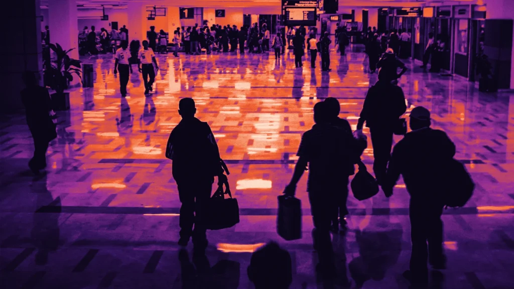 Passengers walking through an airport terminal, in Arcsen colours
