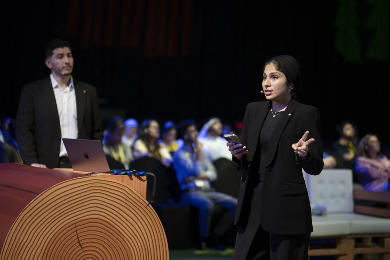 Arcsen consultants giving a live demo to an audience at Agentforce World Tour Dubai 2025