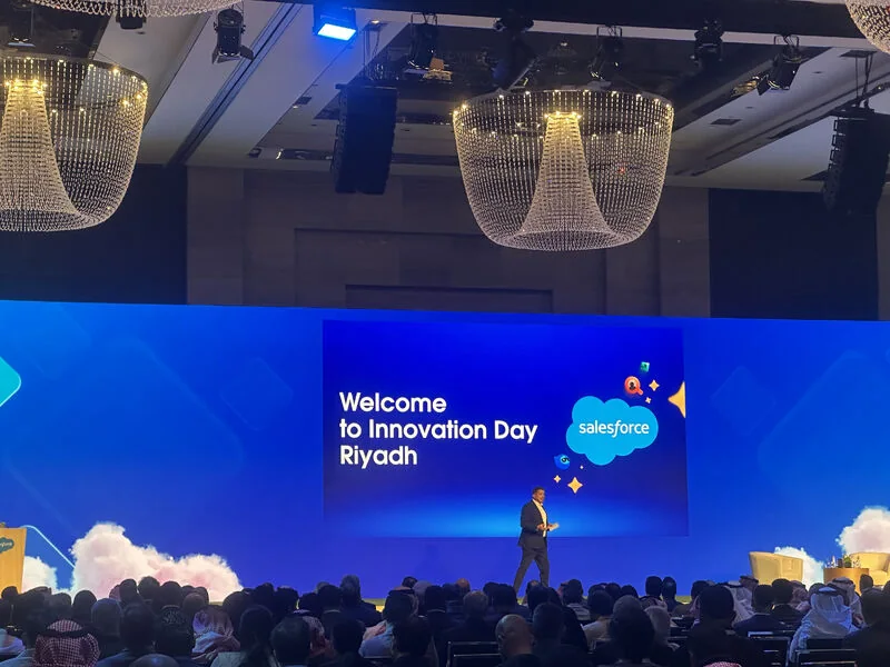 The main stage at Salesforce Innovation Day Riyadh 2025, with a speaker under a screen reading Welcome to Innovation Day Riyadh