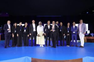 The Arcsen team on stage receiving the Salesforce Sales Excellence award